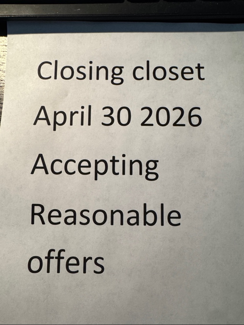 Printed Sign — Black Text on White Paper